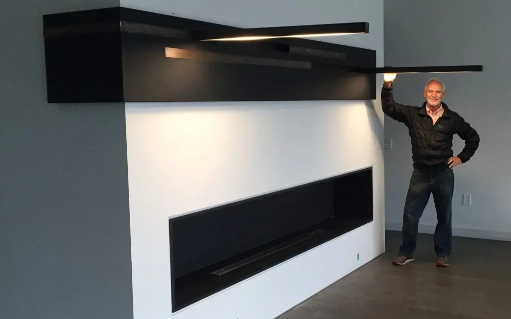 Custom fireplace with rotating arm lights